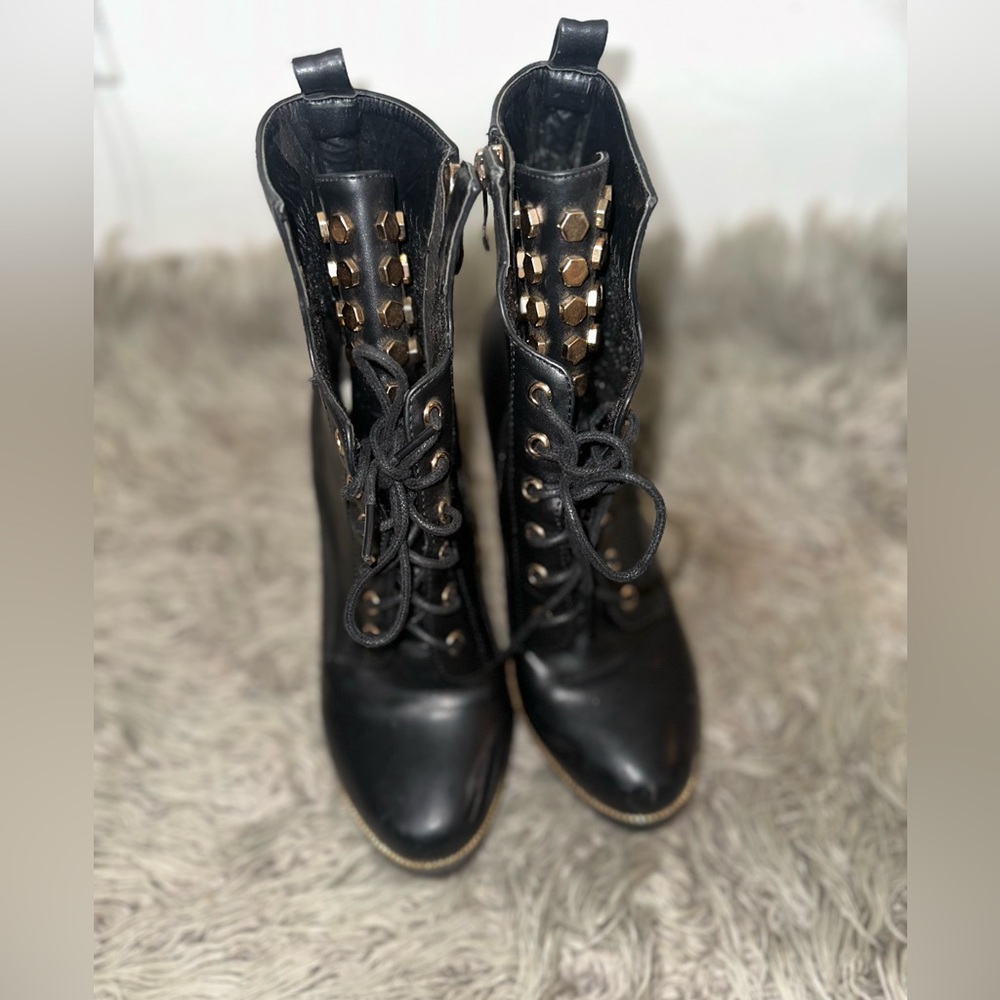 Black and gold booties from Miss Lola